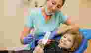 Пациент на приёме у стоматолога